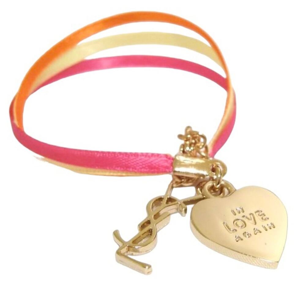 M VTG YSL Yves Saint Laurent In Love Again Gold Heart Logo Charm Ribbon Bracelet
